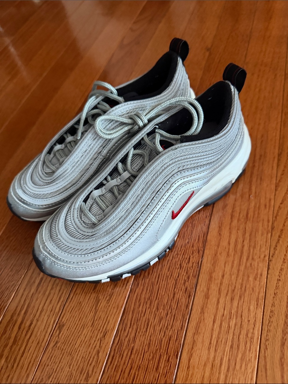 Nike Kids Silver Sneakers with Red Swoosh